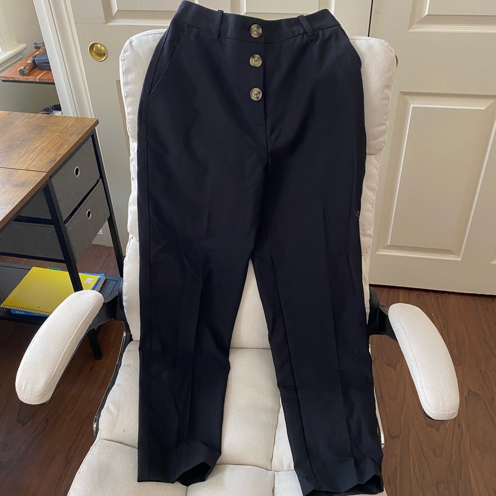 Black Zara trousers with tags still on